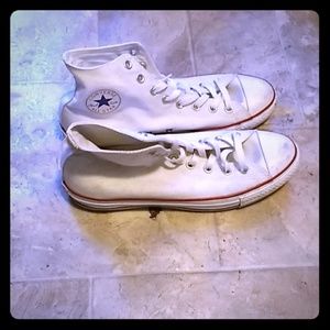 A pair of white converse